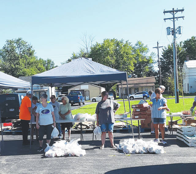 The Hamersville Community Action Team (HCAT) partnered with the Interparish Mobile Food Pantry from Cincinnati, part of the Freestore Foodbank, to gift free groceries to families Aug. 31. Photo provided